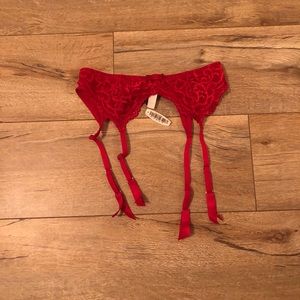 Red lace thigh garder